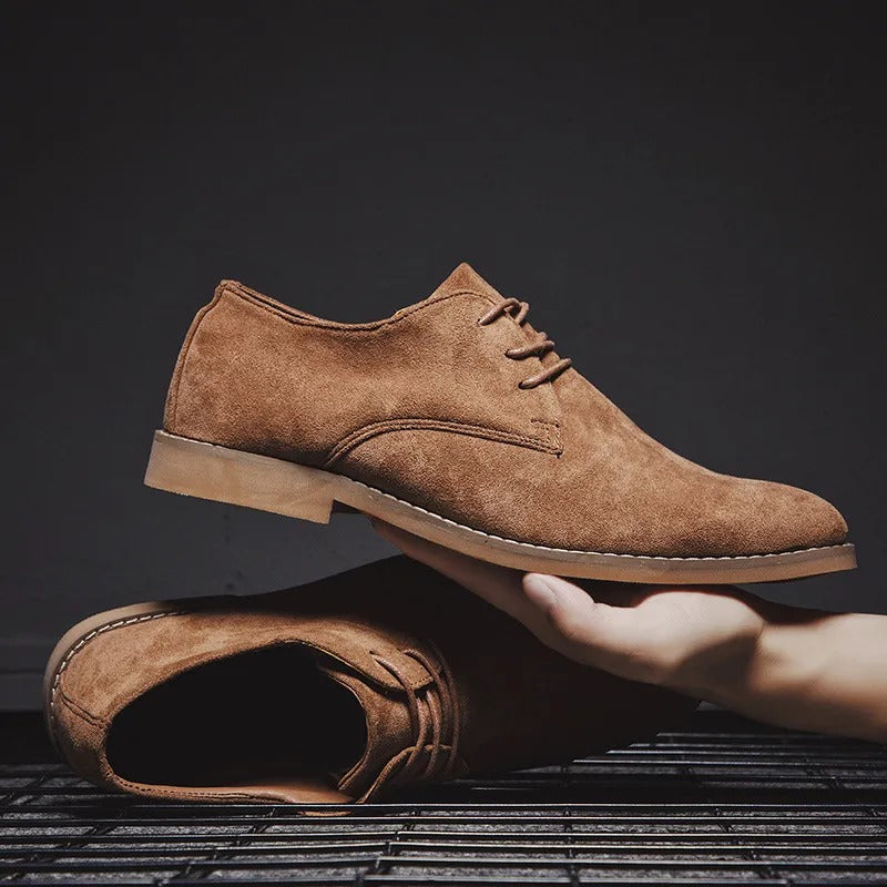 Men's Classic Lace-Up Derby Shoes - Plain Toe - Brown pair, held in hand
