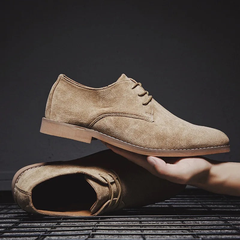 Men's Classic Lace-Up Derby Shoes - Plain Toe - Khaki pair, held in hand